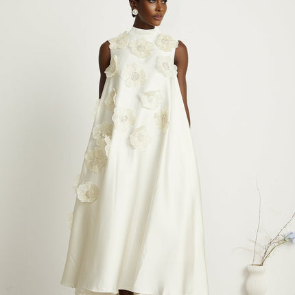 Caterinella Cream White Floral Midi Dress 100 Percent Polyester Sleeveless A-line Dress with Floral Appliques and Bead Embellishments Crew Neck and Rear Zip Fastening Midi Length Size M Model 5'10 Chic Femininity