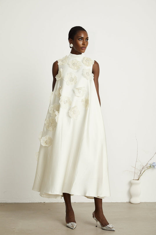 Caterinella Cream White Floral Midi Dress 100 Percent Polyester Sleeveless A-line Dress with Floral Appliques and Bead Embellishments Crew Neck and Rear Zip Fastening Midi Length Size M Model 5'10 Chic Femininity