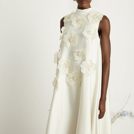 Caterinella Cream White Floral Midi Dress 100% Polyester Sleeveless A-line with Floral Appliques and Bead Embellishments Crew Neck and Rear Zip Fastening Midi Length Worn by 5'10" Model in Size M