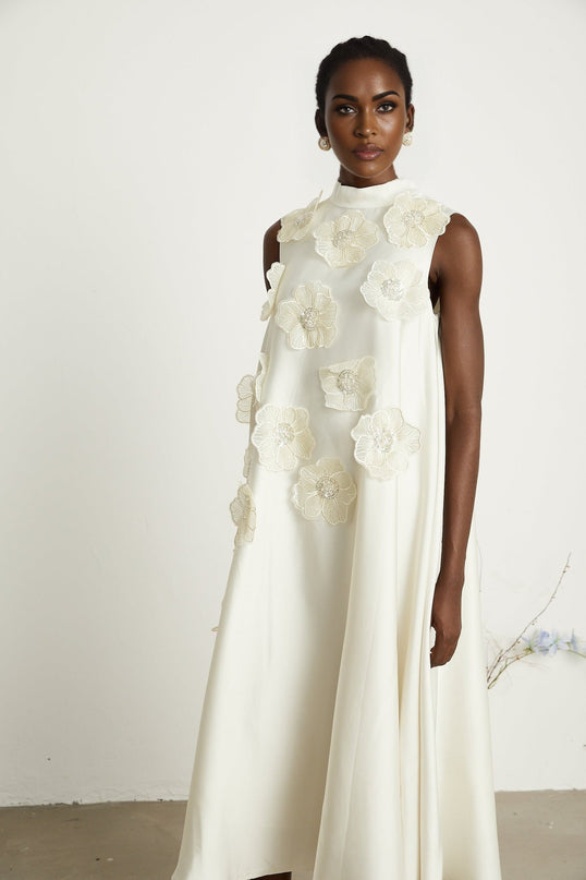 Caterinella Cream White Floral Midi Dress 100% Polyester Sleeveless A-line with Floral Appliques and Bead Embellishments Crew Neck and Rear Zip Fastening Midi Length Worn by 5'10" Model in Size M