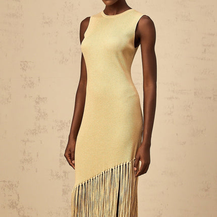 Celeste Midi Dress in Neutrals ribbed knit fringed edge macramé metallic threading asymmetrical hem slip-on style timeless silhouette understated chic palette luxury midi-length marvel statement piece Terylene fiber sartorial masterpiece
