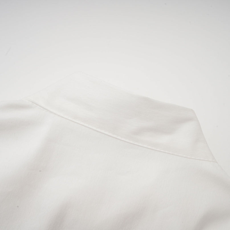 Céleste white pleated scarfcollar shirt