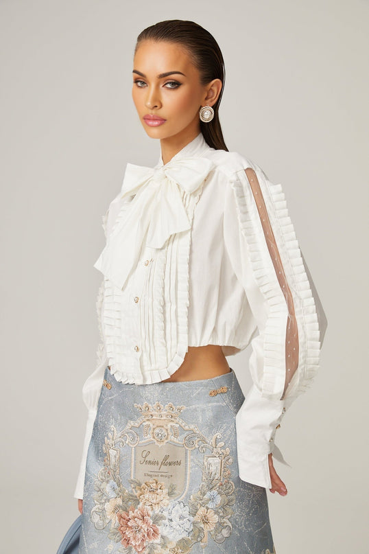 Céleste white pleated scarfcollar shirt