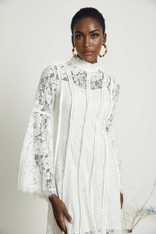 Céline White Lace A-Line Midi Dress with Flared Sleeves and Ruffled Hemline