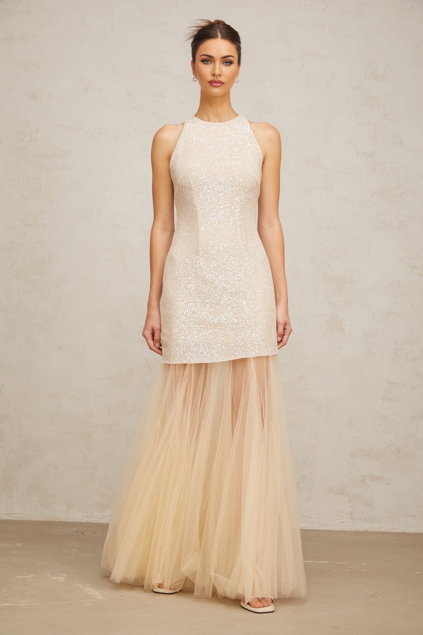 Champagne colored maxi dress with sequined bodice and tulle skirt panels elegant formal gown