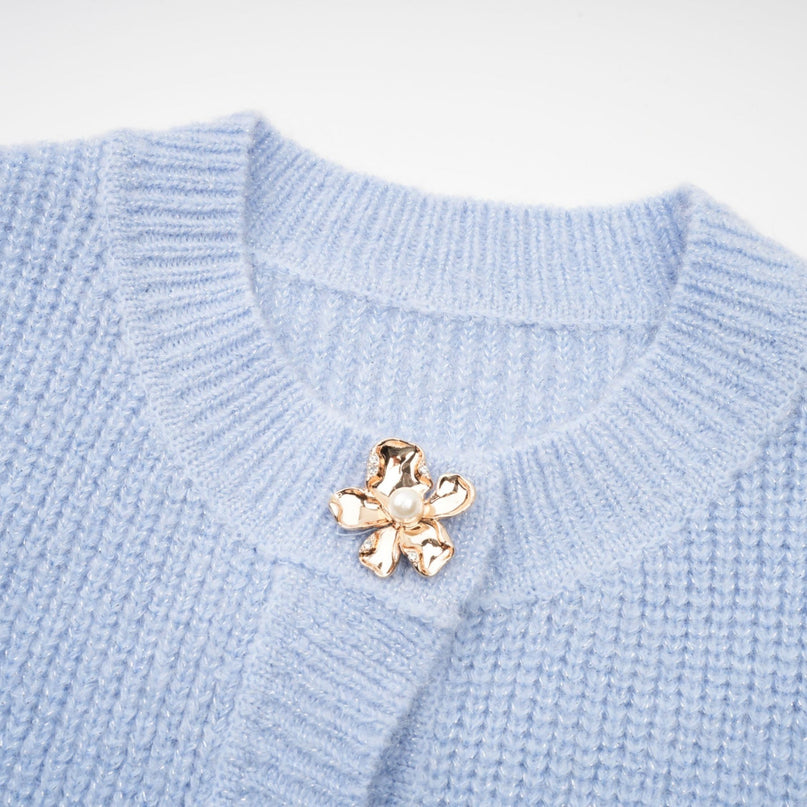 Chantal blue knit blouse and skirt matching set displayed together on a plain background