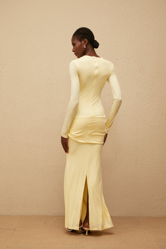 Charlotte Maxi Dress in Yellow with crew neck, long sleeves, fitted waistline, and flared hem