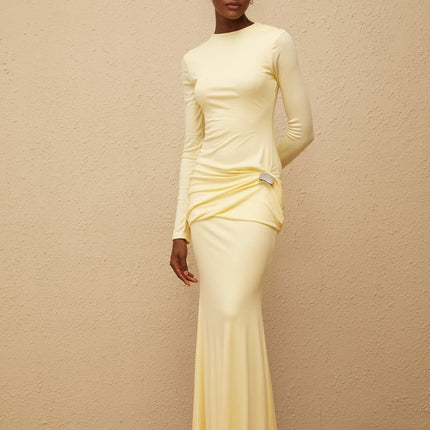 Charlotte Maxi Dress in Yellow crew neck long sleeves fitted waistline flared hem gathered detailing shirred panel embossed silver-tone hardware rear slit zip fastening 95% Lyocell 5% Spandex refined style impeccable craftsmanship