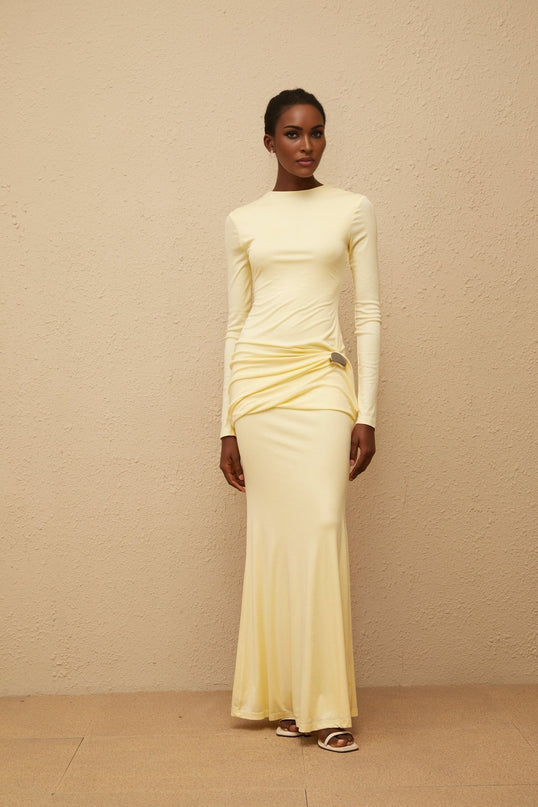 Charlotte Maxi Dress in Yellow crew neck long sleeves fitted waistline flared hem gathered detailing shirred panel embossed silver-tone hardware rear slit zip fastening 95% Lyocell 5% Spandex refined style impeccable craftsmanship