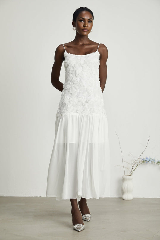 Chelsea White Floral Maxi Dress 100 Polyester Square Neck Spaghetti Straps Rear Zip Fastening Panelled Applique Delicate Floral Embellishments Pleat Detailing Maxi Length Sleeveless Elegant Luxurious Special Occasion Chic Aesthetic Exquisite Ensemble Refined Style Craftsmanship