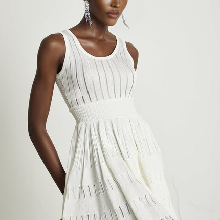 Cherish White Mini Dress U-neck Sleeveless Cut-out Waist Tightened Flared Skirt Pleated Detailing Luxury Style Comfort