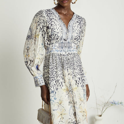 Chloe White Floral Maxi Dress with Plunging V-neck and Ruffled Hem