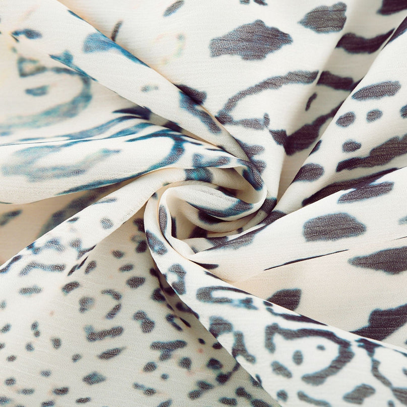 Chloe White Floral Maxi Dress with Plunging V-neck and Ruffled Hem in 65% Terylene and 35% Rayon blend