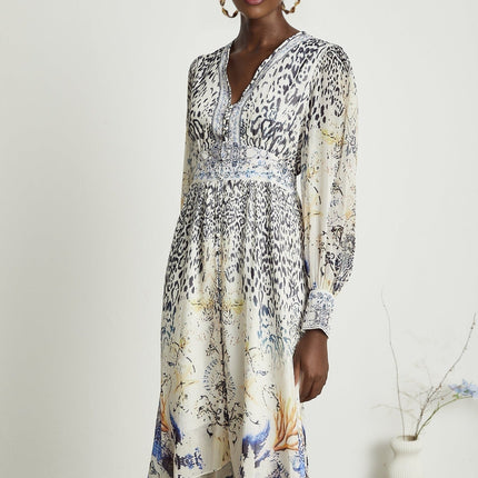 Chloe White Floral Maxi Dress with V-neck and Ruffled Hem in Terylene and Rayon