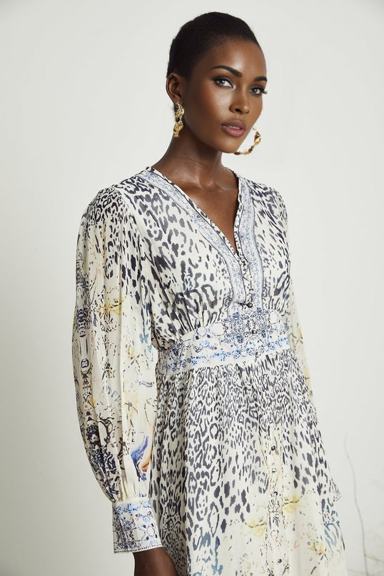 Chloe White Floral Maxi Dress with V-neck and ruffled hem in 65% Terylene and 35% Rayon