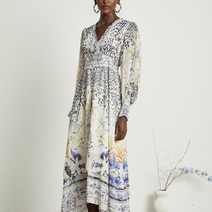 Chloe White Floral Maxi Dress with V-neck and ruffled hem in Terylene and Rayon blend