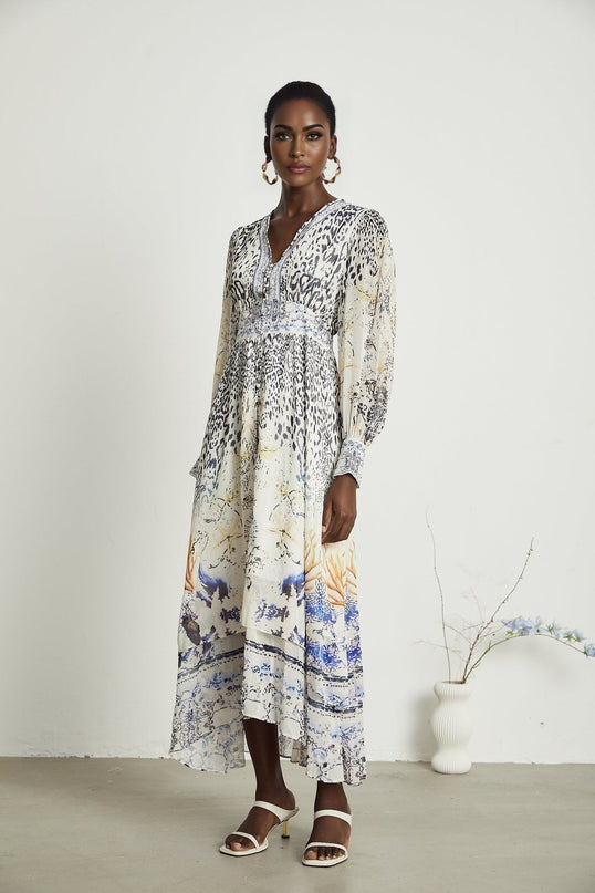 Chloe White Floral Maxi Dress with V-neck and ruffled hem in Terylene and Rayon blend