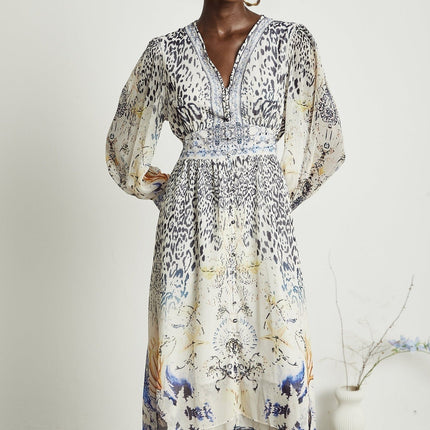 Chloe White Floral Maxi Dress with V-Neck and Ruffled Hem in 65% Terylene and 35% Rayon