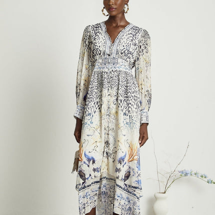 Chloe White Floral Maxi Dress with V-Neck and Ruffled Hem in 65% Terylene and 35% Rayon