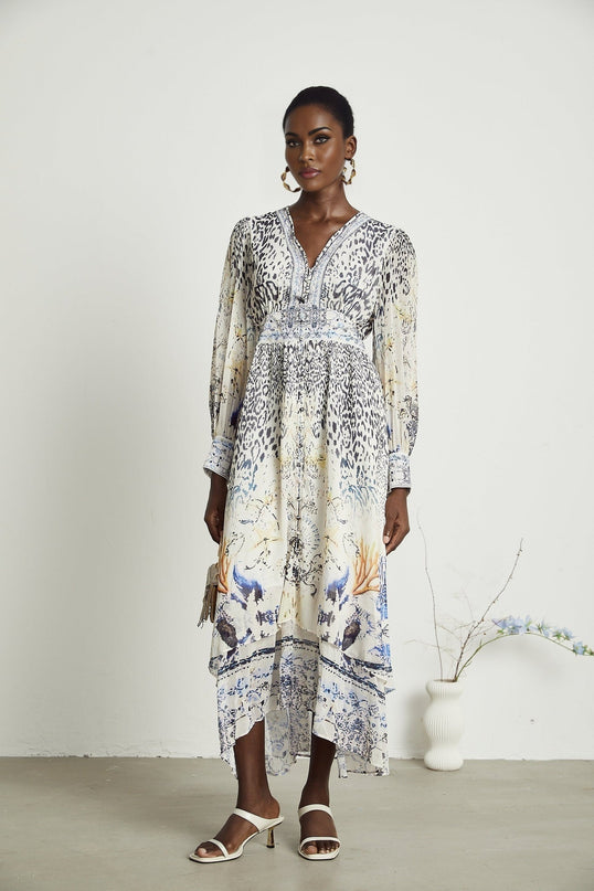 Chloe White Floral Maxi Dress with V-Neck and Ruffled Hem in 65% Terylene and 35% Rayon