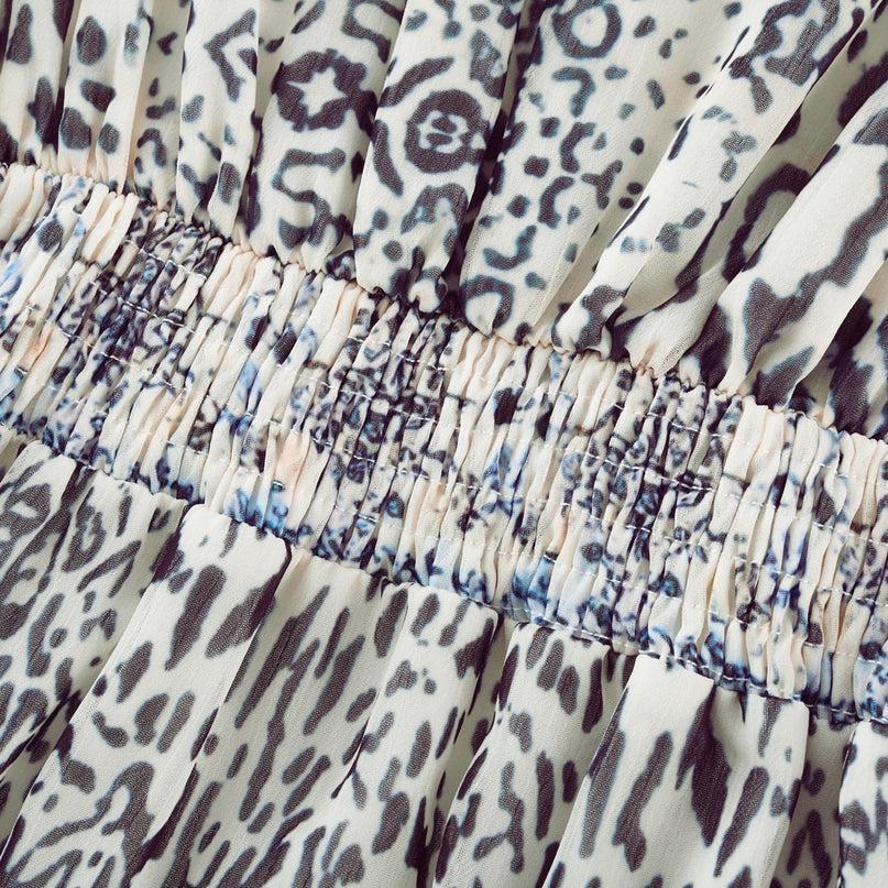 Chloe White Floral Maxi Dress with V-neck and ruffled hem