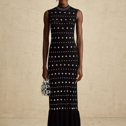 Cinzietta Black Crochet Knit Maxi Dress with Stud Embellishments and Ruffled Hem