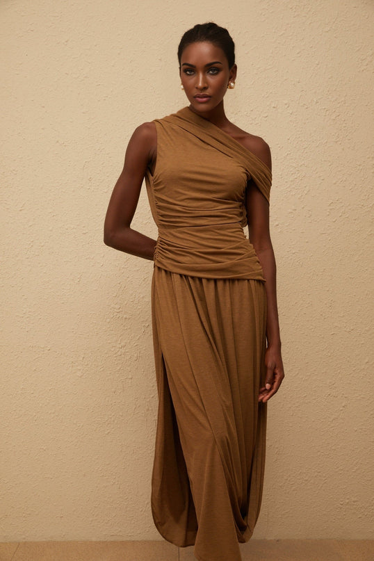 Clara Brown One-Shoulder Maxi Dress Ruched Detailing Asymmetrical Hem Stretch Fabric Side Zip Fastening Luxurious Terylene Fiber Spandex Elegant Glamour Avant-Garde Charm Captivating Presence Style Comfort Statement Piece Day Evening Affairs