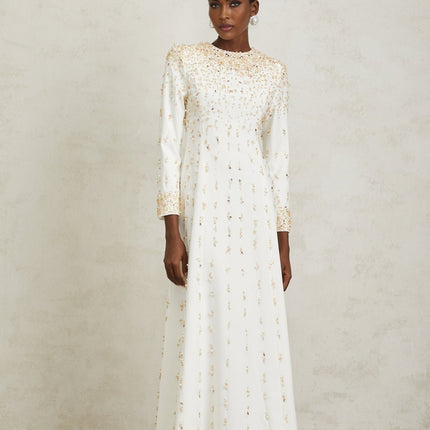 Clara Maxi Dress in White with sequin, faux-pearl, and crystal embellishments, rear zip fastening, crafted from 65% Cotton and 35% Terylene fiber