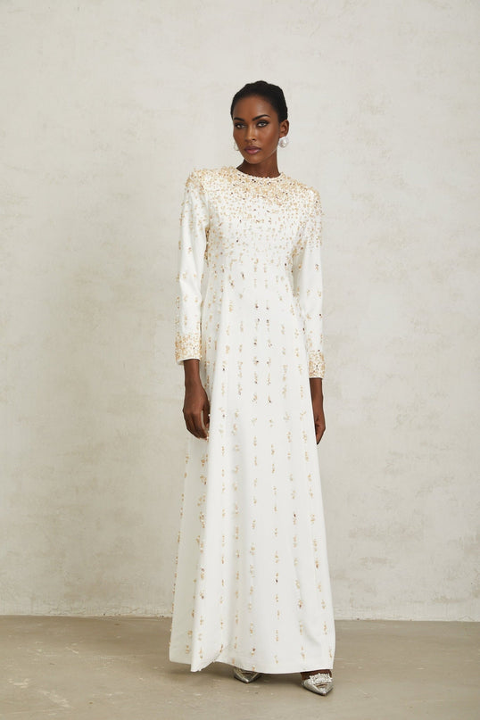 Clara Maxi Dress in White with sequin, faux-pearl, and crystal embellishments, rear zip fastening, crafted from 65% Cotton and 35% Terylene fiber