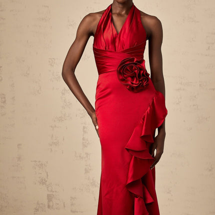 Clara Maxi Dress in Wine Red Halterneck Satin Finish Cinched Waist Side Slit Ruffle Detailing 3D Petal Embellishments Rear Tie Fastening Acetate Polyester Blend