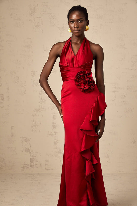 Clara Maxi Dress in Wine Red Halterneck Satin Finish Cinched Waist Side Slit Ruffle Detailing 3D Petal Embellishments Rear Tie Fastening Acetate Polyester Blend