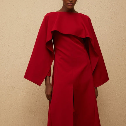 Clara Red Midi Dress Bateau Neck Long Sleeves Fitted Waistline Cape Design Asymmetrical Hem Front Slit