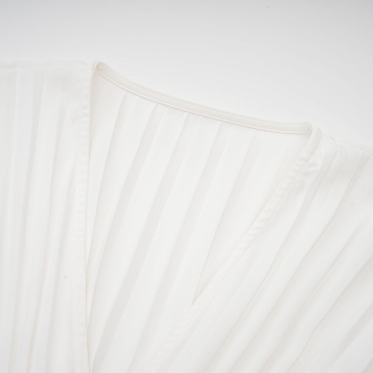Claudette Vneck pleated mini dress