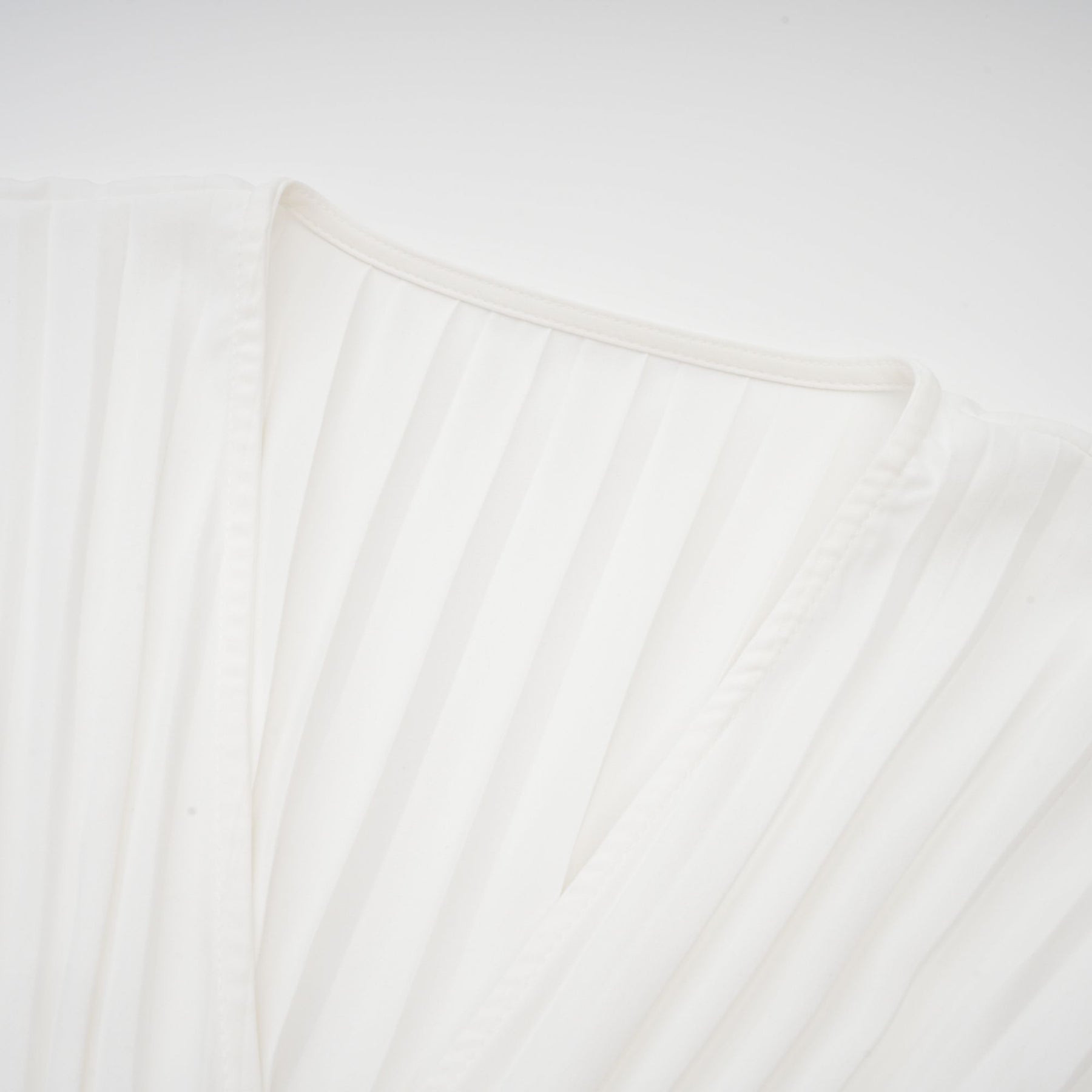 Claudette Vneck pleated mini dress