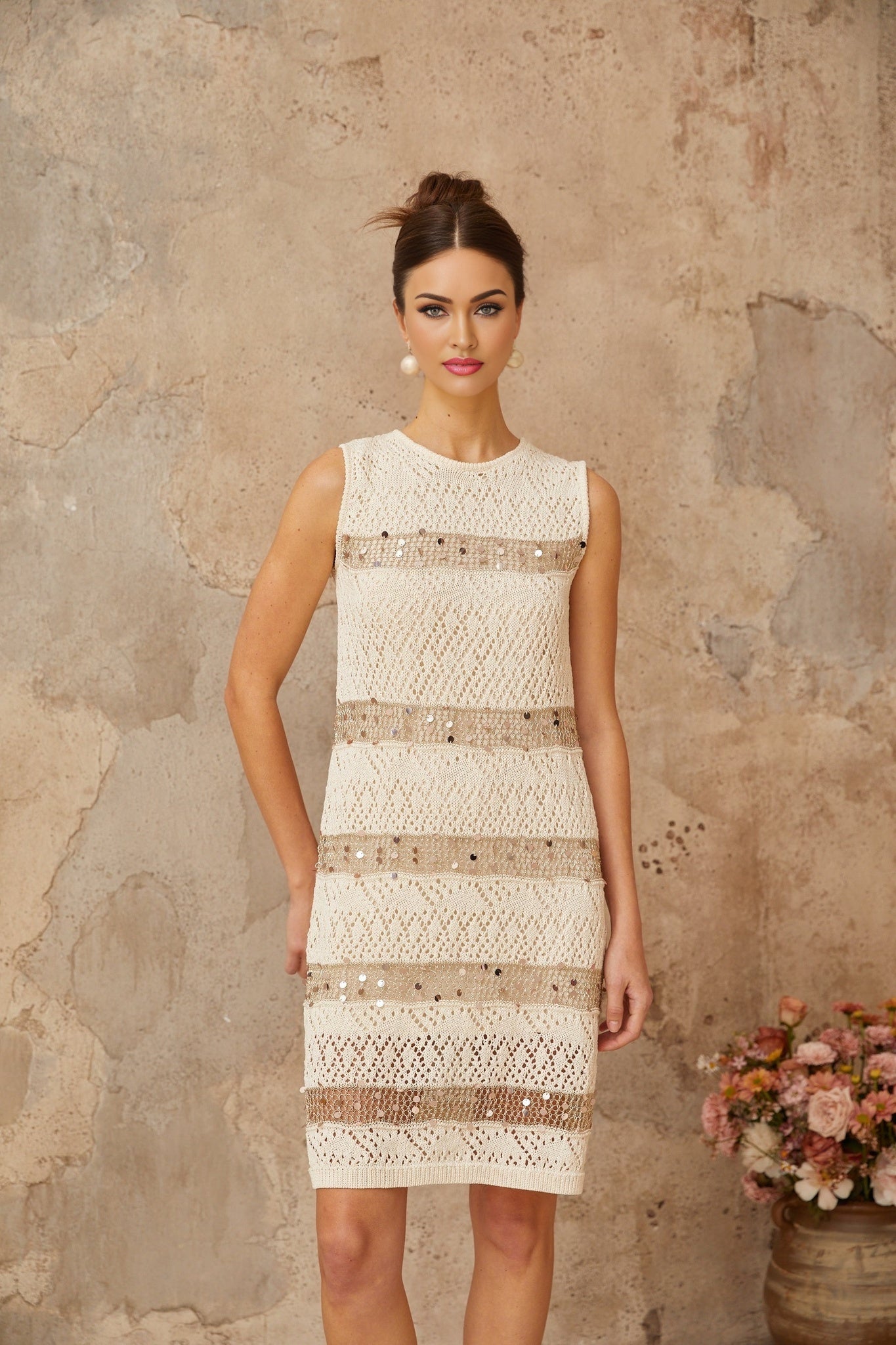 Colette mini dress in off white color with sequin embellishments and crochet knit texture