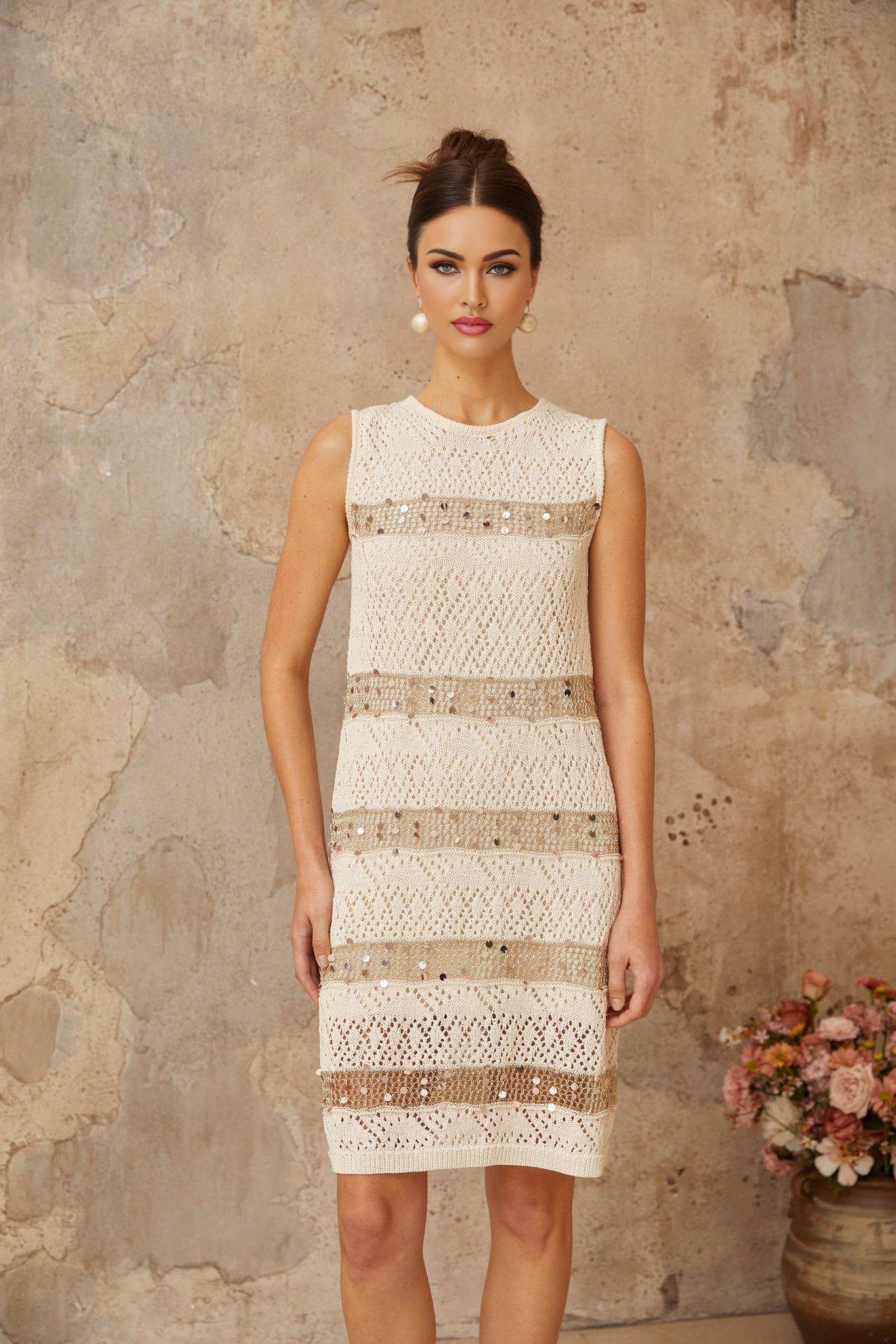 Colette mini dress in off white color with sequin embellishments and crochet knit texture