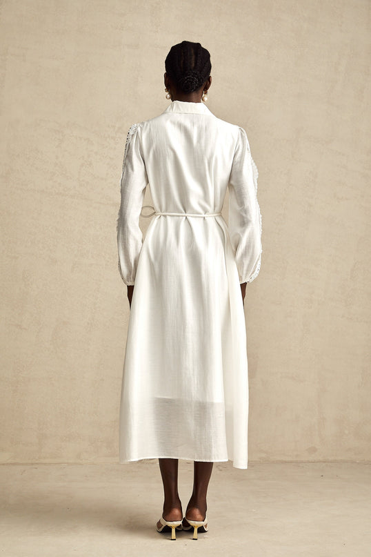 Colette white midi dress with lace details and tied waist on a female model