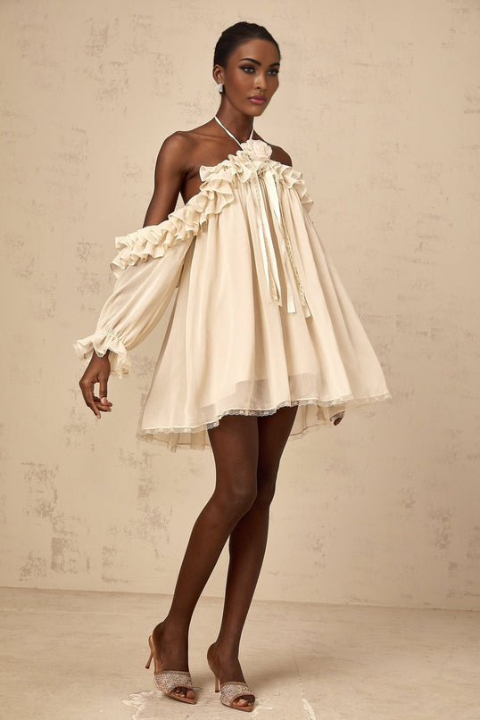Colomba Mini Dress in Neutrals Terylene Fiber Floral Appliqué Ruffled Halterneck Long Sleeves Pleated Lace Trim Ribbon Design Thigh-Length Lined Elegant Sophisticated Rear Tie Fastening Special Occasion Timeless Grace