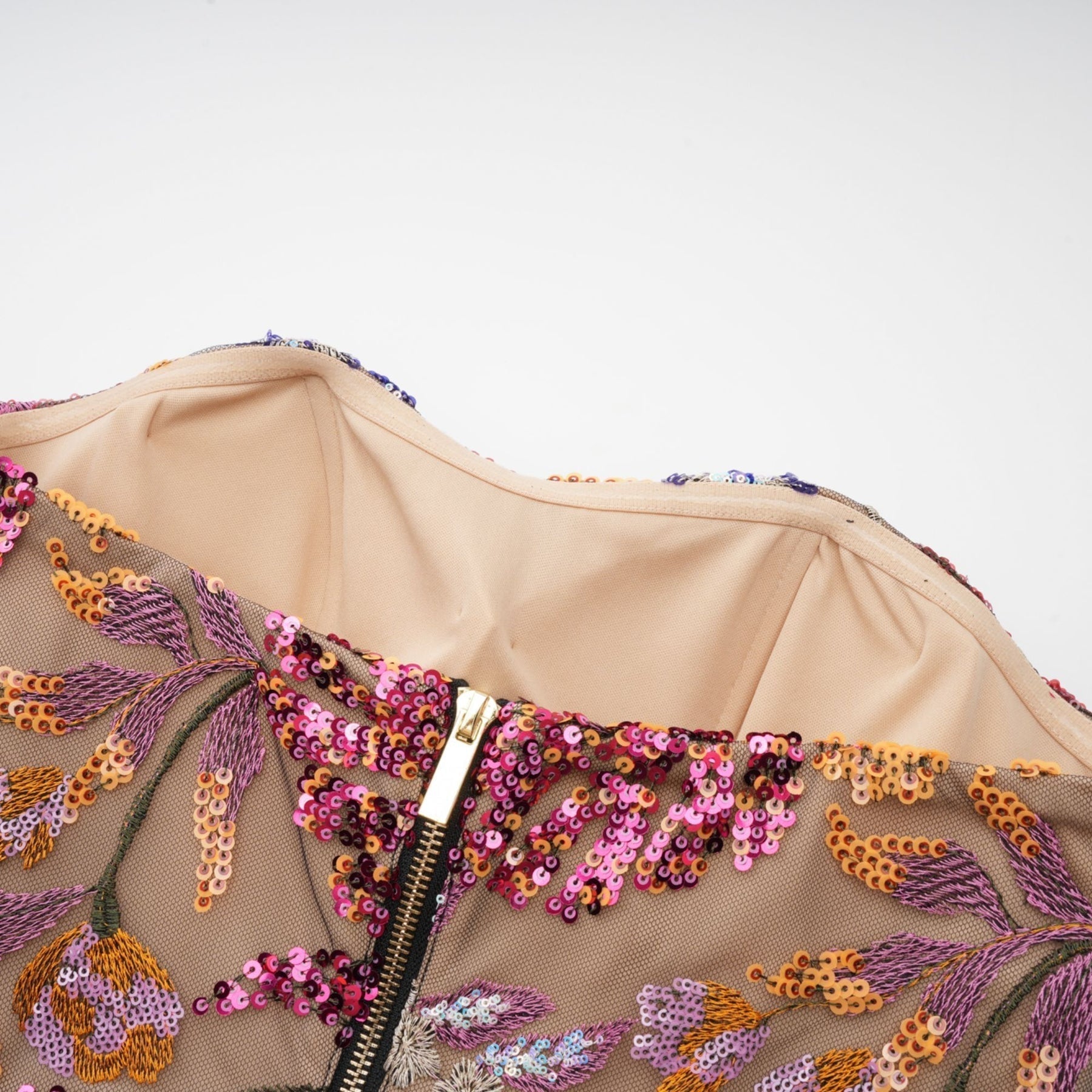Colorful midi dress with floral embroidery and sequin embellishments by Therese