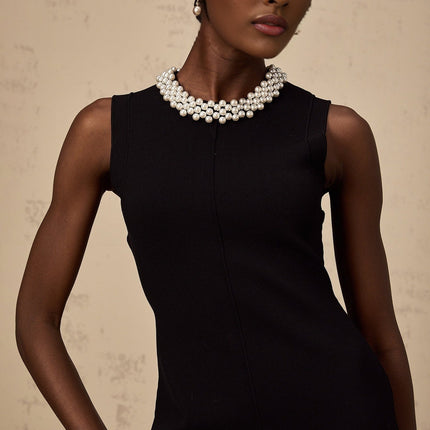 Concetta Black Knitted Mini Dress with Ruffled Detail and Faux-Pearl Embellishment