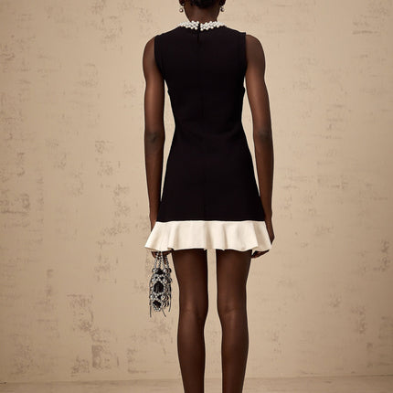 Concetta Black Knitted Mini Dress with Ruffled Detailing and Faux-Pearl Embellishment