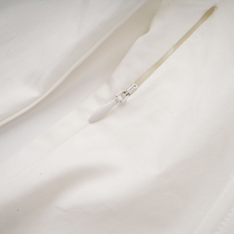 Coraline White Long Sleeve Mini Dress with Buttoned Cuffs and Embossed Gold-Tone Buttons