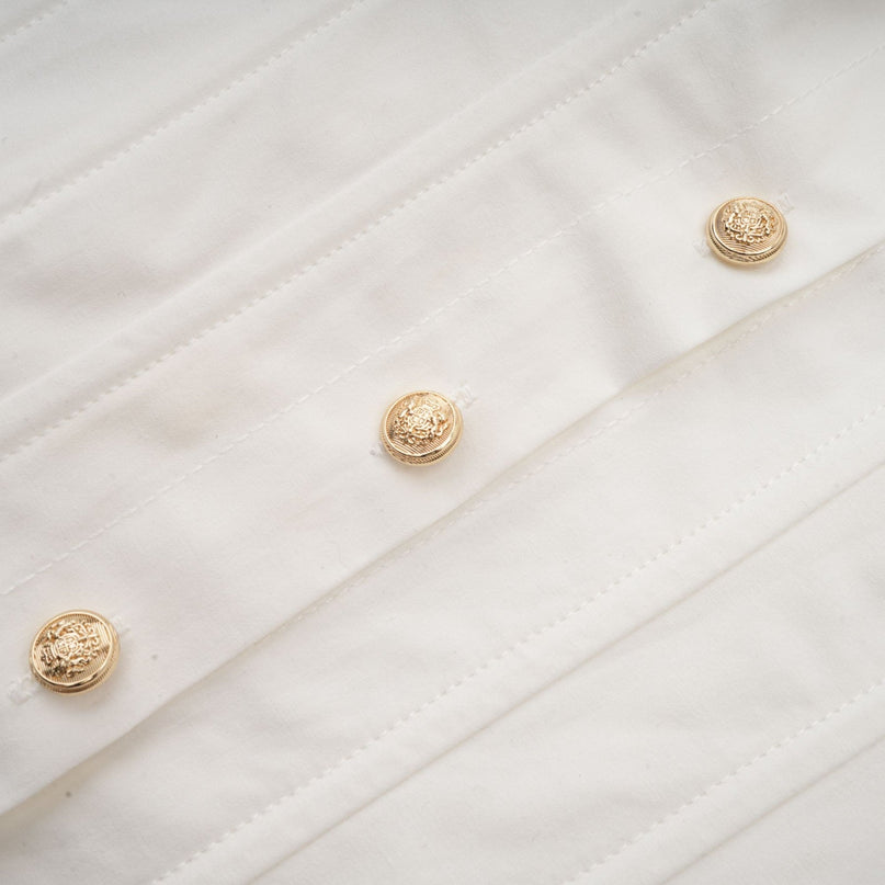 Coraline White Long Sleeve Mini Dress with Buttoned Cuffs and Embossed Gold-Tone Buttons