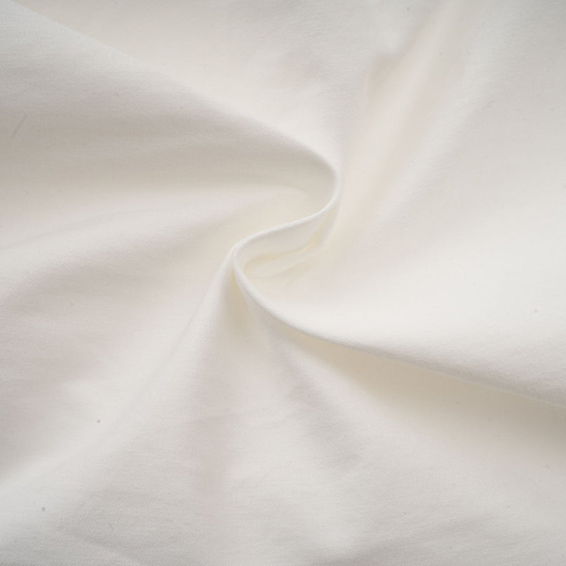 Coraline White Mini Dress with Embossed Gold Buttons and Pleated Detailing