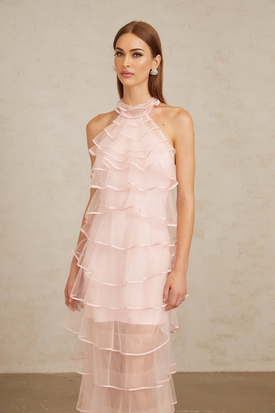 Cosima Maxi Dress in Pink tiered halterneck ruffled tulle sleeveless beauty elegant halterneck design tiered silhouette rear zip perfect fit luxurious 100% Nylon Polyamide fiber composition formal events special occasions stunning pink dress turn heads sophisticated epitome luxury Cosima Maxi Dress