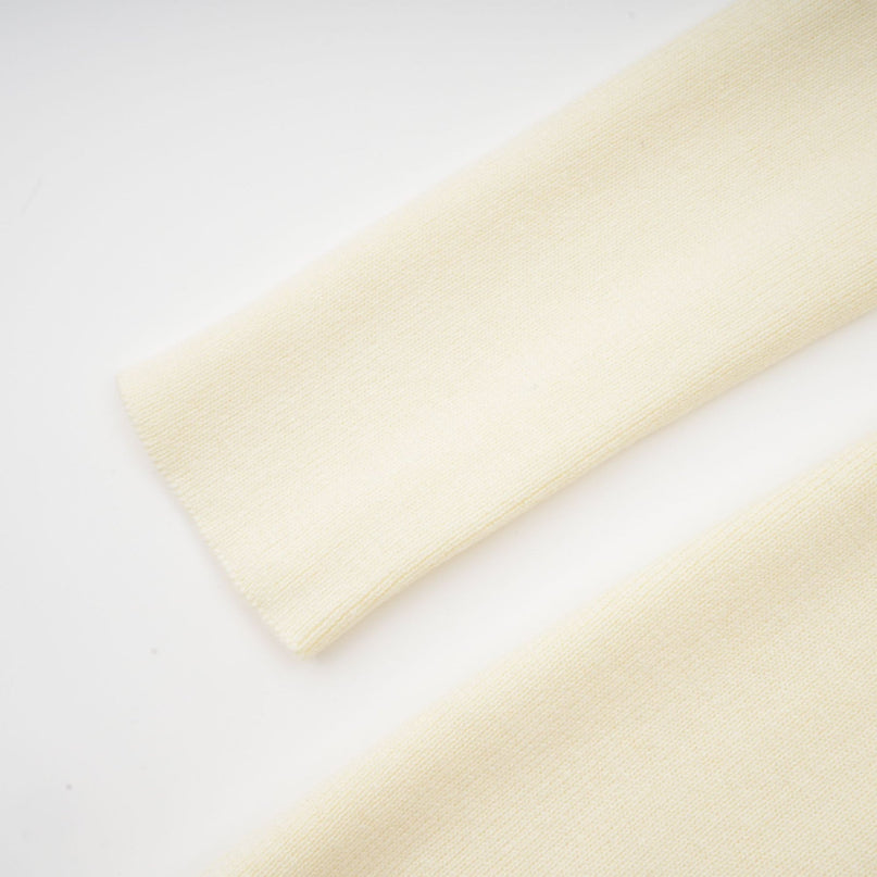 Costanza White Knitted Midi Dress with Pleated Design