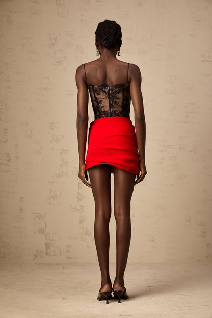 Cropped black vest top with delicate floral lace pattern sleeveless design and scoop neckline