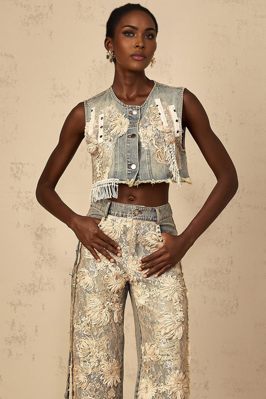 Cropped light blue denim top with lace panels and short sleeves