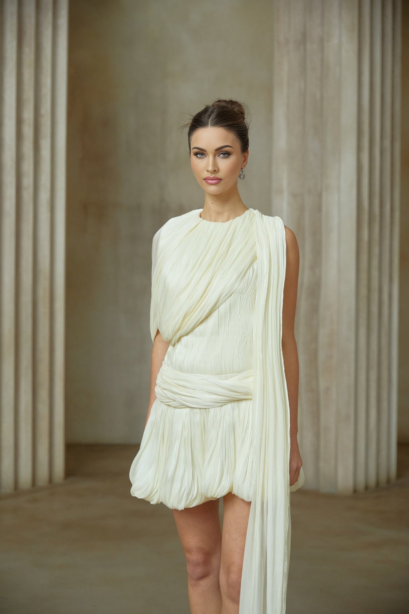 Cyrielle pleated mini dress in light fabric with decorative ribbon accent along neckline and waist
