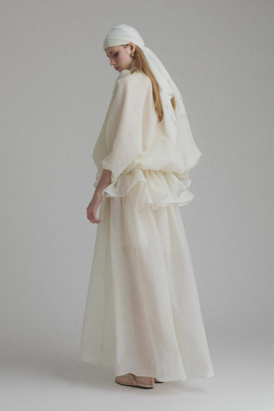 Dakota Cream White Maxi Dress Tied Neck Batwing Sleeves Ruffled Pleat Design Partial Lining Pleated Detailing Luxurious Terylene Fiber Semi-Sheer Construction Maxi Length Sophisticated Elegant Versatile Feminine Grace